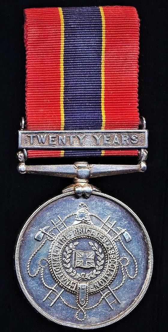 National Fire Brigades Association. Silver 20 years long service medal, with integral top brooch bar 'Twenty Years'. Officially numbered & named (4825 Alfred Bairstow.)