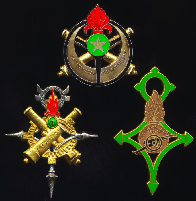France: A grouping of 3 x commemorative replica regimental badges of the Foreign Legion 'Sahara Artillery Regiments', by the official Paris maker 'Arthus Bertrand' for the Legion Etrangere