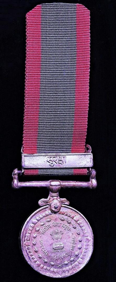 India: Special Service Medal (Visesh Seva Padak). With clasp 'Suraksha' (2878743 LNk R S Tomer Rajaif)