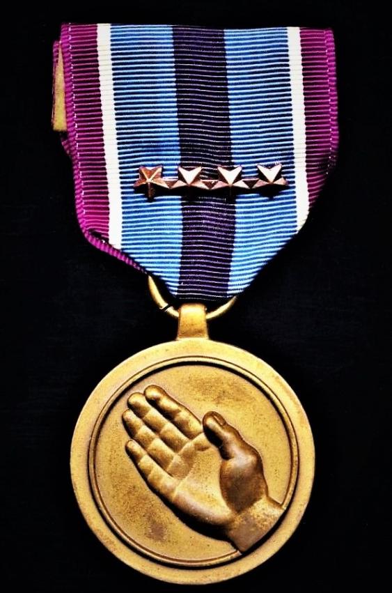 United States: Humanitarian Service Medal (HSM). With 4 x Bronze 'Service Stars' on riband