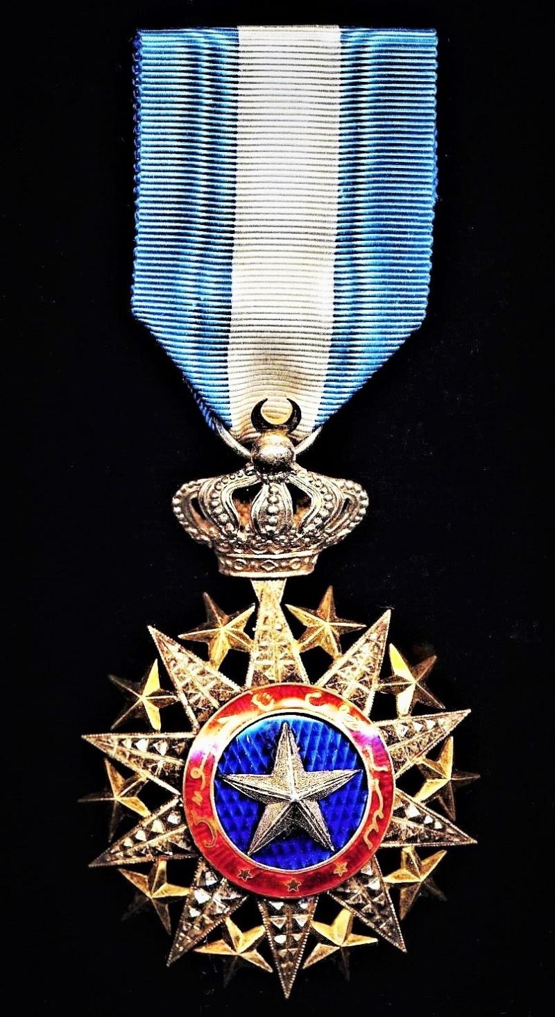 France (Colonial): Order of Nicham El Anouar (Ordre du Nicham El Anouar Chevalier). 5th Class 'Knights' silver, gilt and enamel breast badge