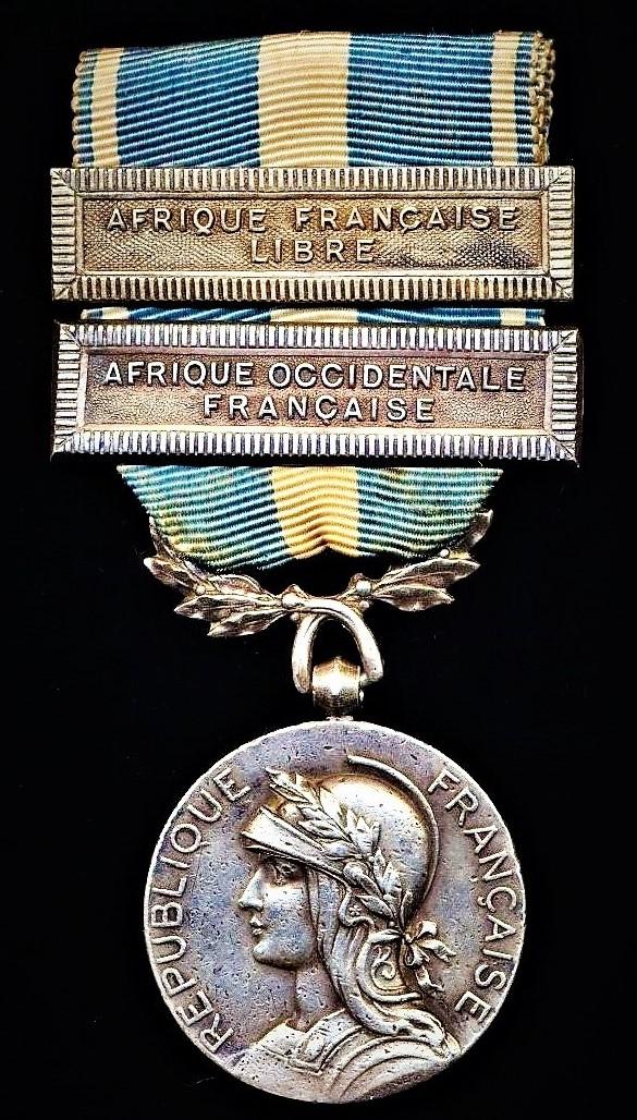 France: Colonial Medal (Medaille Coloniale).  2nd type, with uni-face wreath suspension & clasp (agrafe) 'Afrique Occidentale Francaise' & 'Afrique Francaise Libre'