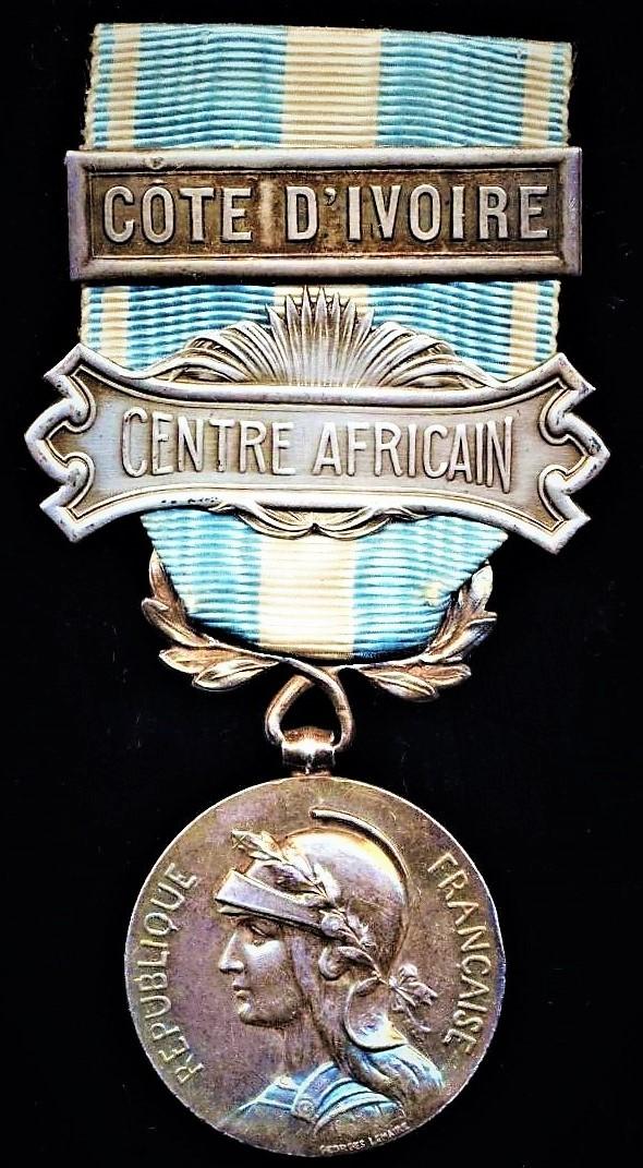 France: Colonial Medal (Medaille Coloniale). 1st type Paris Mint 'Premier Type' with bi-face wreath suspension & 2 x clasps (Grand Mission & agrafe types) 'Centre Africain' & 'Cote D'Ivorie'
