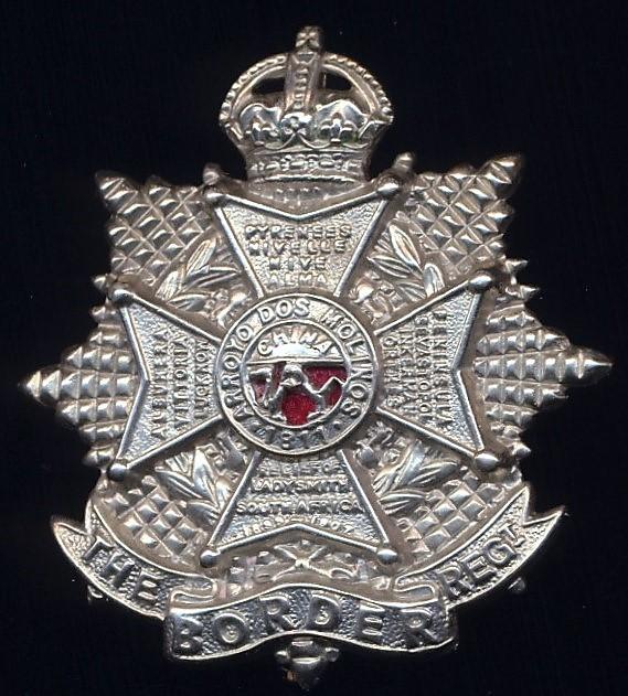 The Border Regiment . King's crown, white metal cap badge