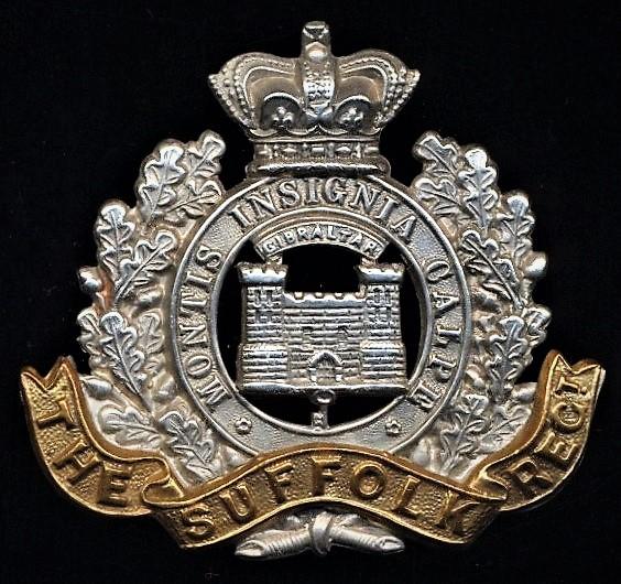 The Suffolk Regiment. Queen Victoria crown, bi-metal cap badge