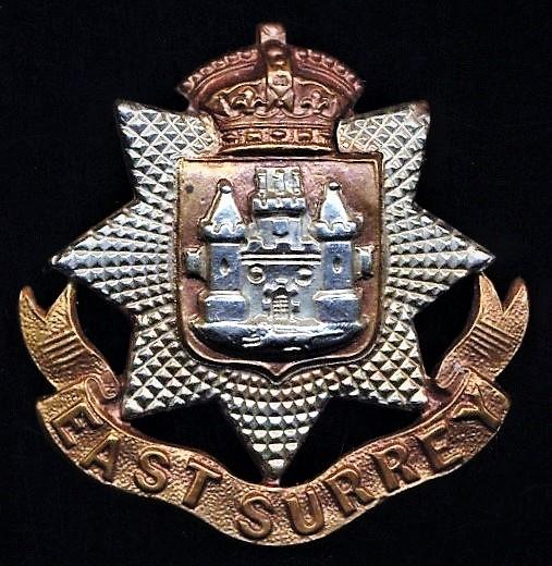 East Surrey Regiment. Queen Victoria crown, bi-metal cap badge