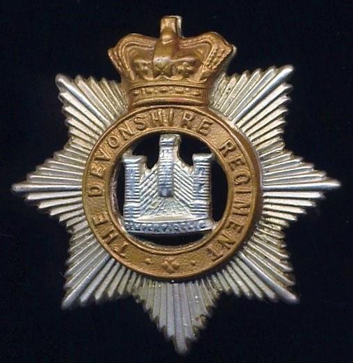 Devonshire Regiment. Queen Victoria crown, bi-metal cap badge