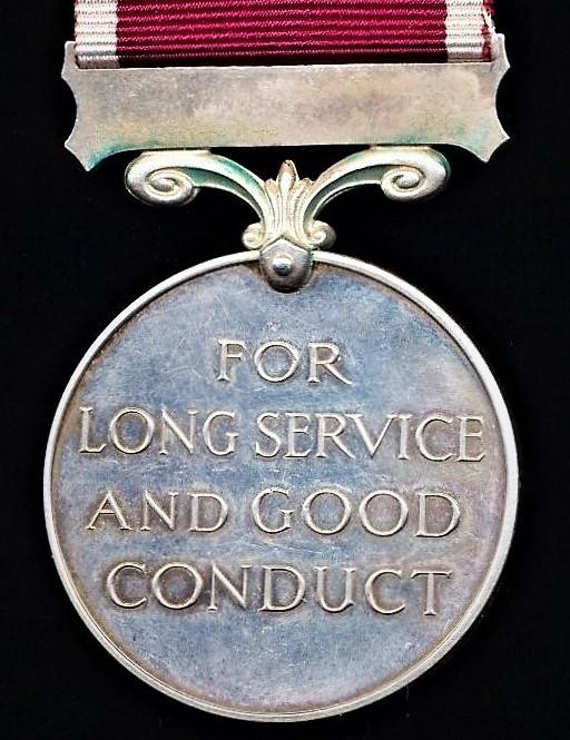 Military Long Service & Good Conduct Medal. GVI, second issue with 'Regular Army' bar (7587461 Sgt. W. E. Bishop. R.E.M.E)