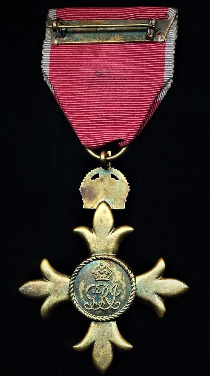 Officer of the Order of the British Empire (Civil Division). 2nd type breast badge, with silvered 'Oakleaves' emblem for Gallantry on riband
