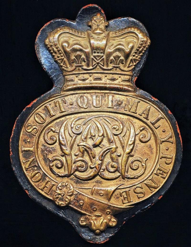 Grenadier Guards: Brass 'Valise Badge'. With 'Victorian' cypher in centre