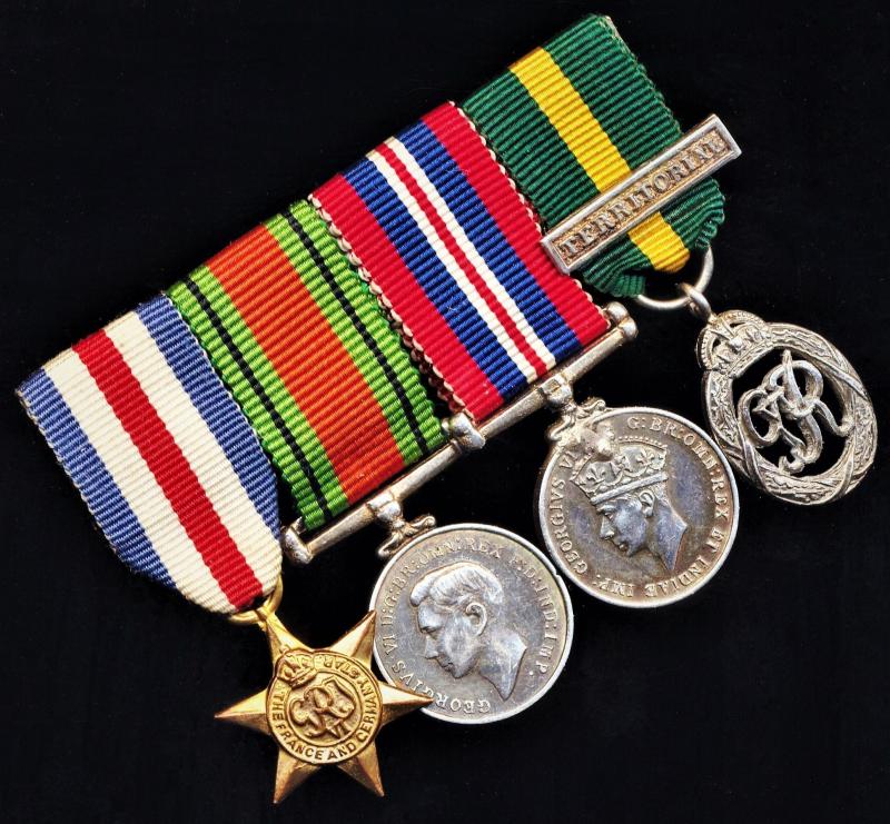 A contemporary un-named and un-attributed group of Second World War and Long Service miniature medals