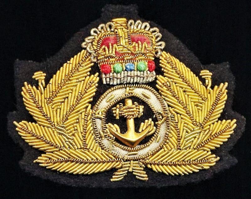 Royal Fleet Auxiliary: Senior officer's cap badge. With EIIR Crown. Wire bullion & cloth cap badge, circa 1953-1960