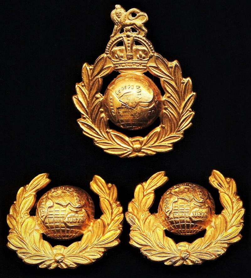 Royal Marines: Lot of King's Crown gilding metal cap badge (1), and pair of companion collar badges (2), as worn circa 1914-1952