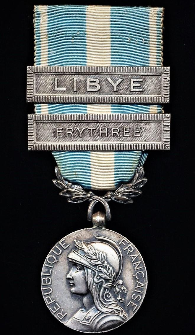 France: Colonial Medal (Medaille Coloniale). 2nd type 'France Libre' London made variant, with uni-face wreath suspension & 2 x clasps (agrafes) 'Erythree' & 'Libye'
