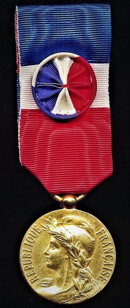 Medal of Honour of Labour (Medaille D'Honneur du Travail). Unsigned design. Gilt (vermeil) grade, with silk rosette on riband. Named & dated (J. P. Corbon 1995)