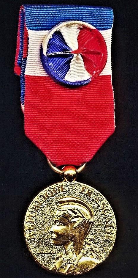 Medal of Honour of Labour (Medaille D'Honneur du Travail). 'Delsart' design variant. Gilt (vermeil) grade, with silk rosette on riband. Named & dated (P. Valentin 1993)