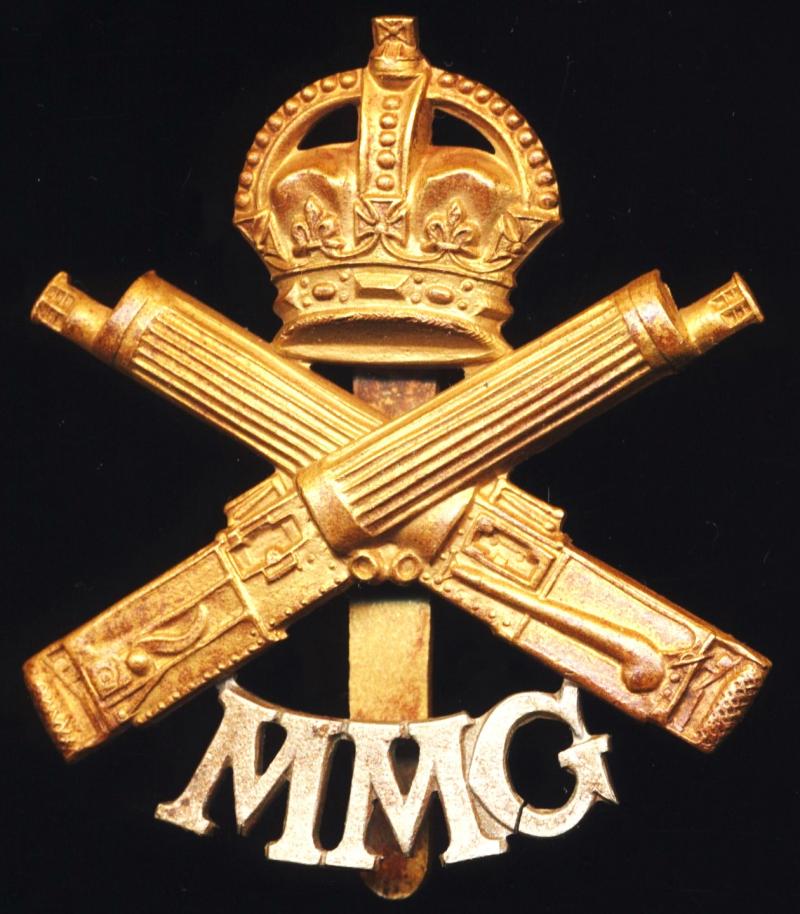 Motor Machine Gun Service / Machine Gun Corps (Motors). 'Kings Crown' bi-metal cap badge