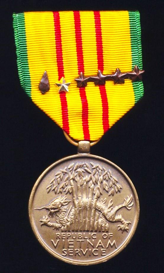 United States: Vietnam Service Medal. With 'Bronze Arrowhead' device , 1 x Silver Star & 4 x Bronze Stars on riband