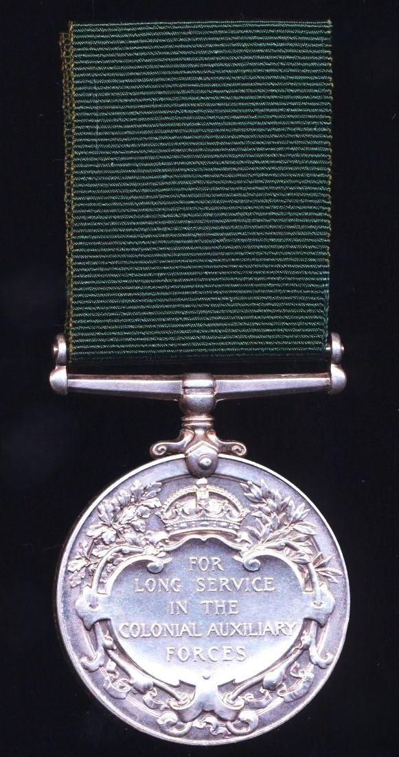 Colonial Auxiliary Force Long Service Medal. GV issue 2nd Type (E.85 Rfm. Thomas H. Cooke, Southern Rhodesia Volunteers.)