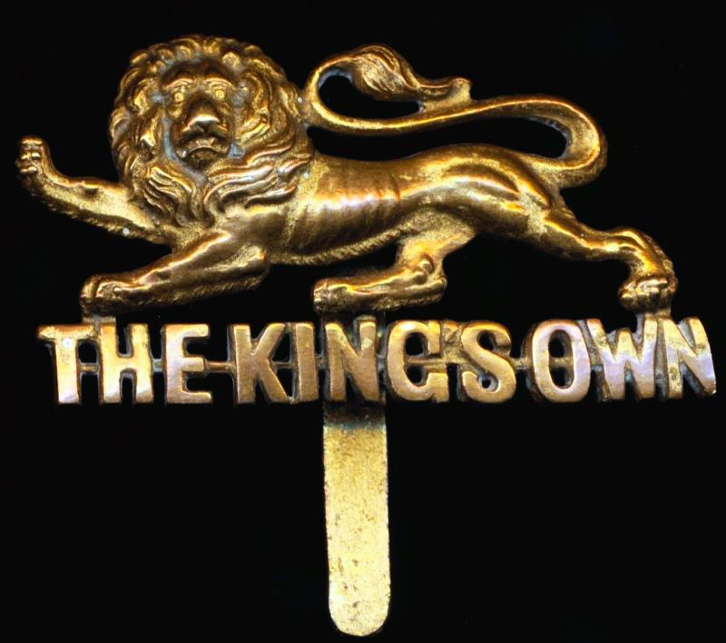 The King's Own Regiment. Gilding metal cap badge. Circa 1914-1952