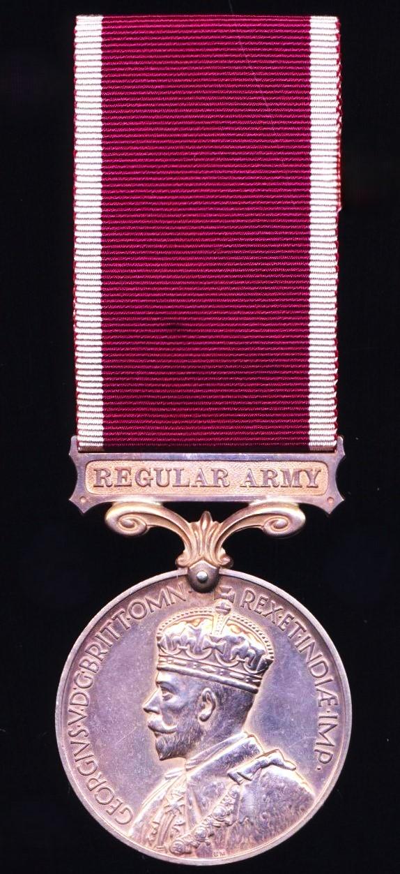 Military Long Service and Good Conduct Medal. GV crowned head issue with 'Regular Army' bar (3179298 Pte. H. C. Allcock. K.O.S.B.)