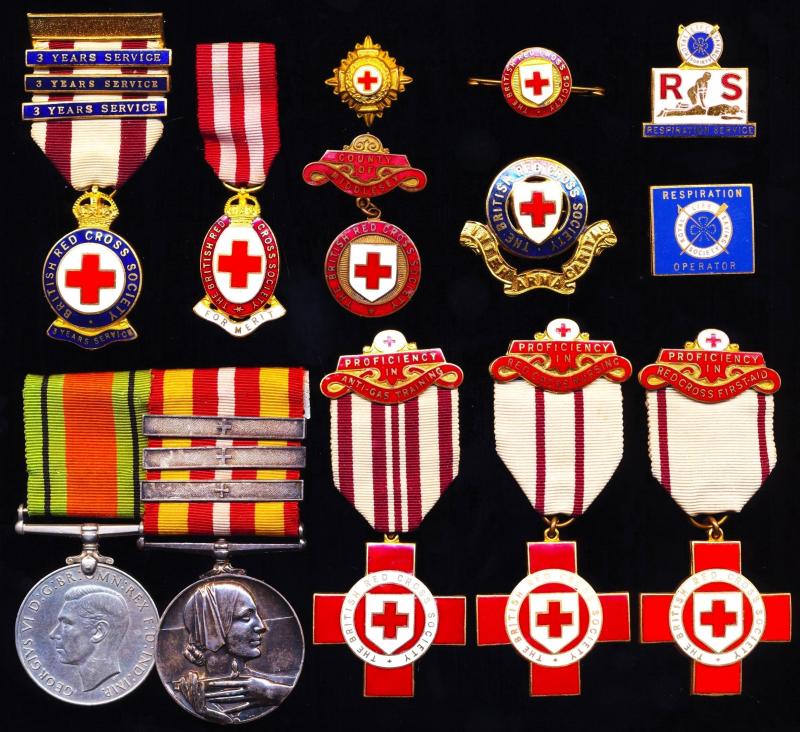 An extensive Second World War era British Red Cross Society 'Home Front' medal group of 8 with insignia: Leader Mary Angier, Air Raid Precaution First Aid Dressing Station, Twickenham, Middlesex & British Red Cross Society Society