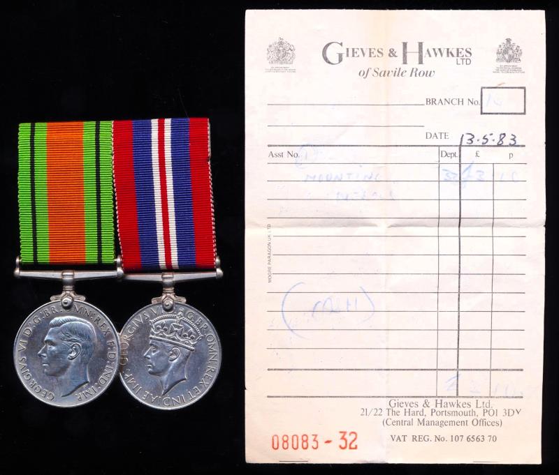 A Military Tailors Professionally Swing-Mounted pair of Second World War Medals: Un-named & unattributed with 'Gieves & Hawkes Ltd' sales receipt