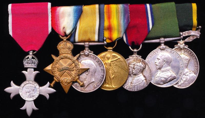 A Volunteer's 'East Africa' casualty medal group of 7: Assistant Controller of Customs, William Robert Clarke, M.B.E., H.M. Indian Customs Service late No. 1 Gun, Bombay Section Volunteer Maxim Gun Company & Bombay Volunteer Rifles