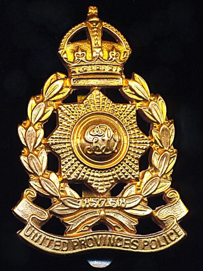 British India: United Provinces Police. King's Crown die-struck gilding-metal cap badge. With makers marks circa 1920-1936