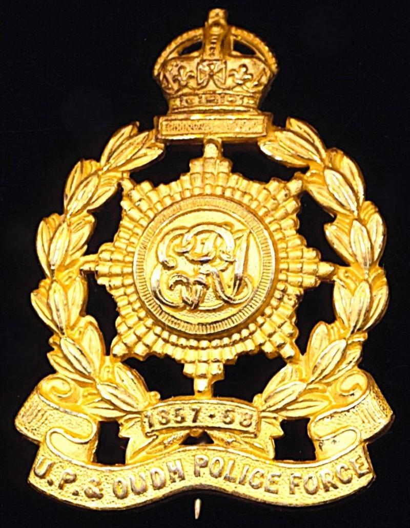 British India: United Provinces & Oudh Police Force. King's Crown die-struck gilt gilding-metal cap badge. Edward VII issue. Circa 1902-1910