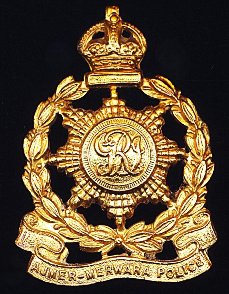 British India: Ajmer-Merwara Police Force (Rajasthan). King's Crown die-struck gilding metal cap badge. Circa 1911-1936