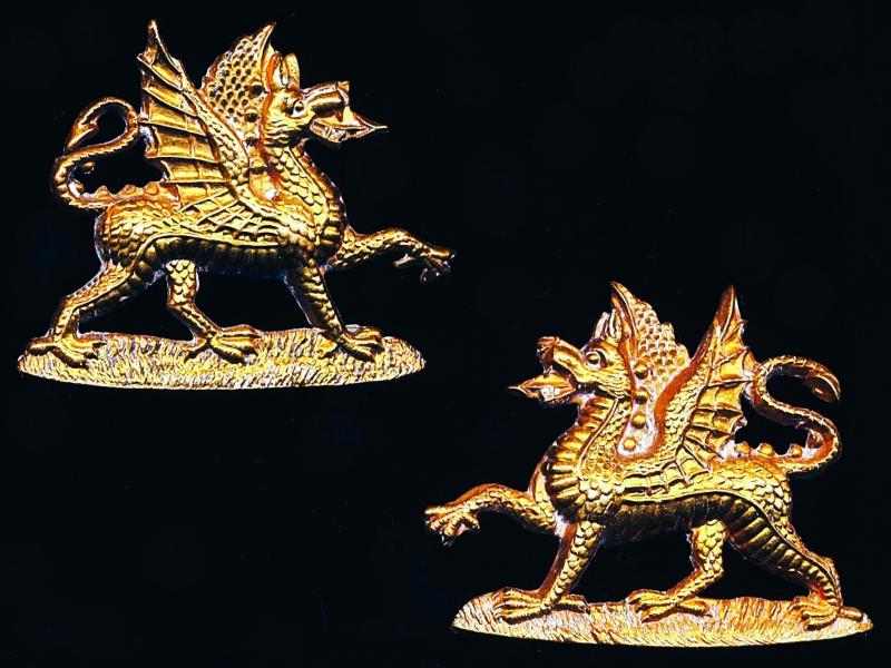 The Buffs: Two facing gilding metal collar badges. Circa 1890-1945