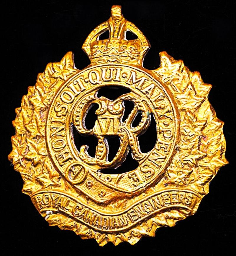 Canada (Dominion): Royal Canadian Engineers. Gilding metal die struck King's Crown cap badge, with GVI cypher