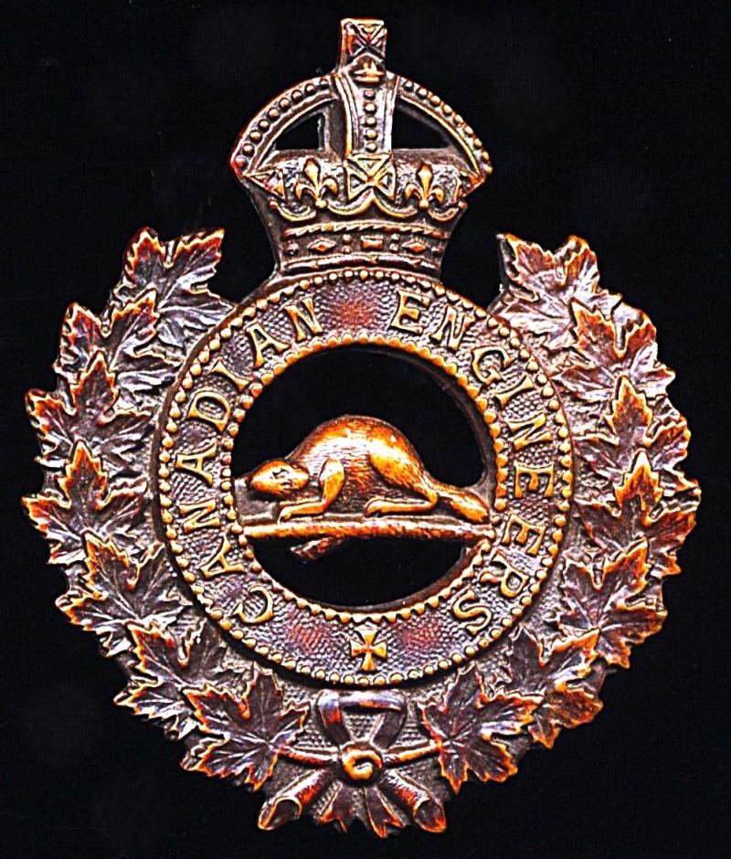 Canada (Dominion): Canadian Engineers (Canadian Expeditionary Force 1914-18). Gilding metal die struck King's Crown cap badge. By Caron Bros