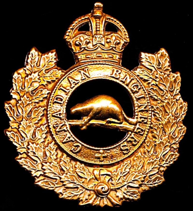 Canada (Dominion): Canadian Engineers (Canadian Expeditionary Force 1914-18). Gilding metal die struck King's Crown cap badge. By Tiptaft