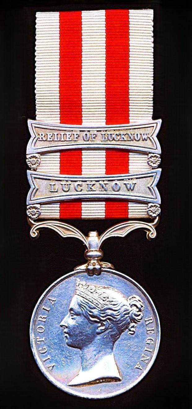 Indian Mutiny Medal 1857-59. With 2 x clasps 'Relief of Lucknow' & 'Lucknow' (Bombr. Ds. Hurly, 3rd. Compy. 5th. Bn. Bl. Foot Art.)