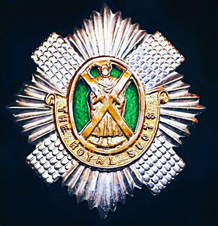 Royal Scots: Cap Badge. 2nd Battalion. Bi-metal with green cloth backing insert, as worn circa 1899-1948