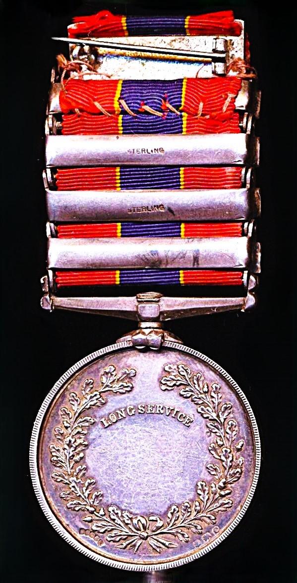 National Fire Brigades Association. Silver 20 years long service medal, with integral 'Twenty Years' bar, and 3 x further service '5 Years' bars. Officially numbered & named (3582 Joseph B. Brooke.)