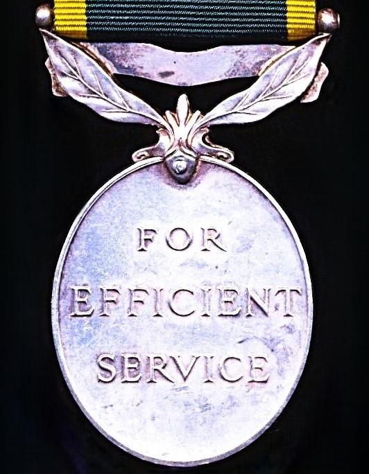 Efficiency Medal. GVI issue, 2nd type obverse legend with 'Territorial' bar (2984135 Pte. H. Campbell. MX.)