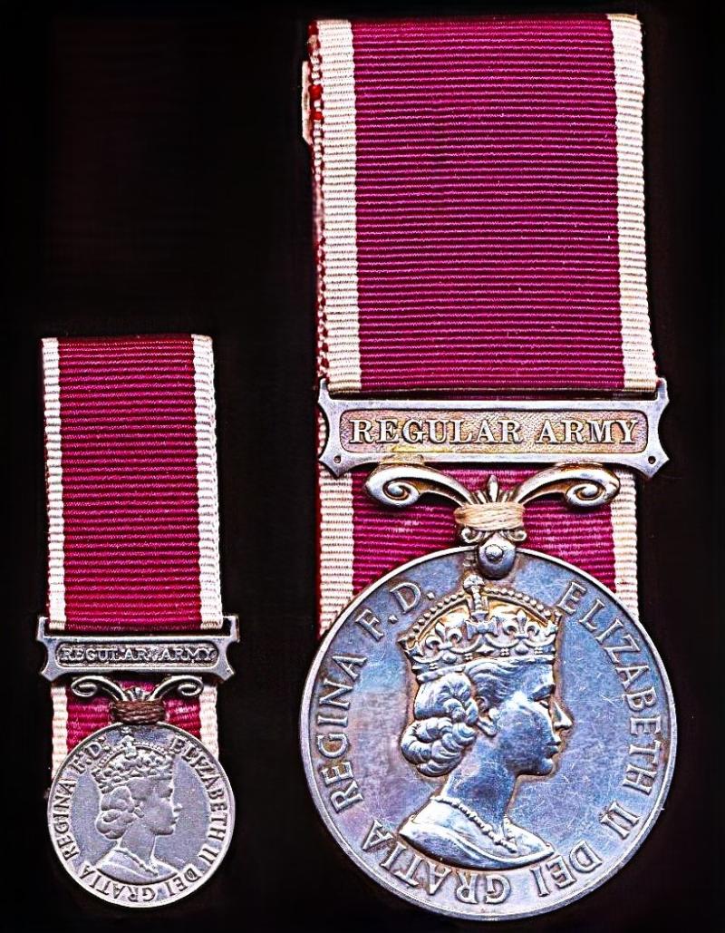 A positively attributed miniature Military Long Service and Good Conduct Medal. EIIR second issue with clasp 'Regular Army' (23879487 Sjt C J Hunt WG