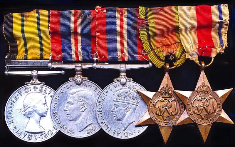 A mounted medal group of 5 'That speaks a thousand words' as-worn by a proud Kenyan veteran of the East Africa Campaign 1940-42 & post-war 'Mau-Mau' Rebellion: Constable Odhiambo Othieno, Kenya Police Reserve