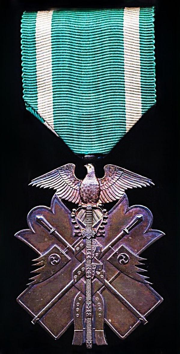 Japan (Showa era): Order of the Golden Kite. 7th Class breast badge. Silver